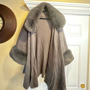 Woman’s grey faux fur wrap